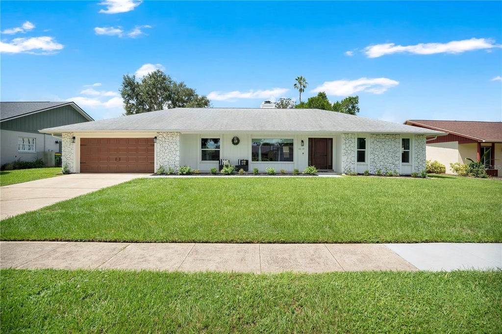 Photo of 6610 Orange Knoll Drive, Belle Isle, FL 32812 (MLS # O6440247)