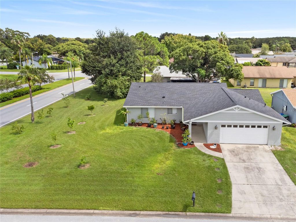 Photo of 10303 Lollipop Lane, Orlando, FL 32821 (MLS # O6374076)