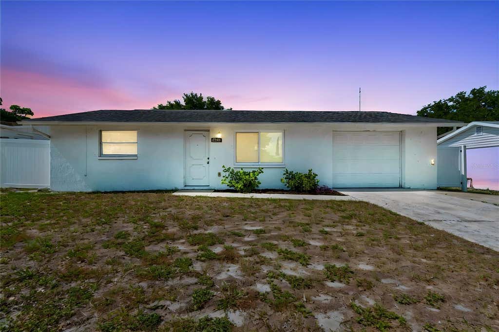 Photo of 6324 Tralee Avenue, New Port Richey, FL 34653 (MLS # TB8521813)