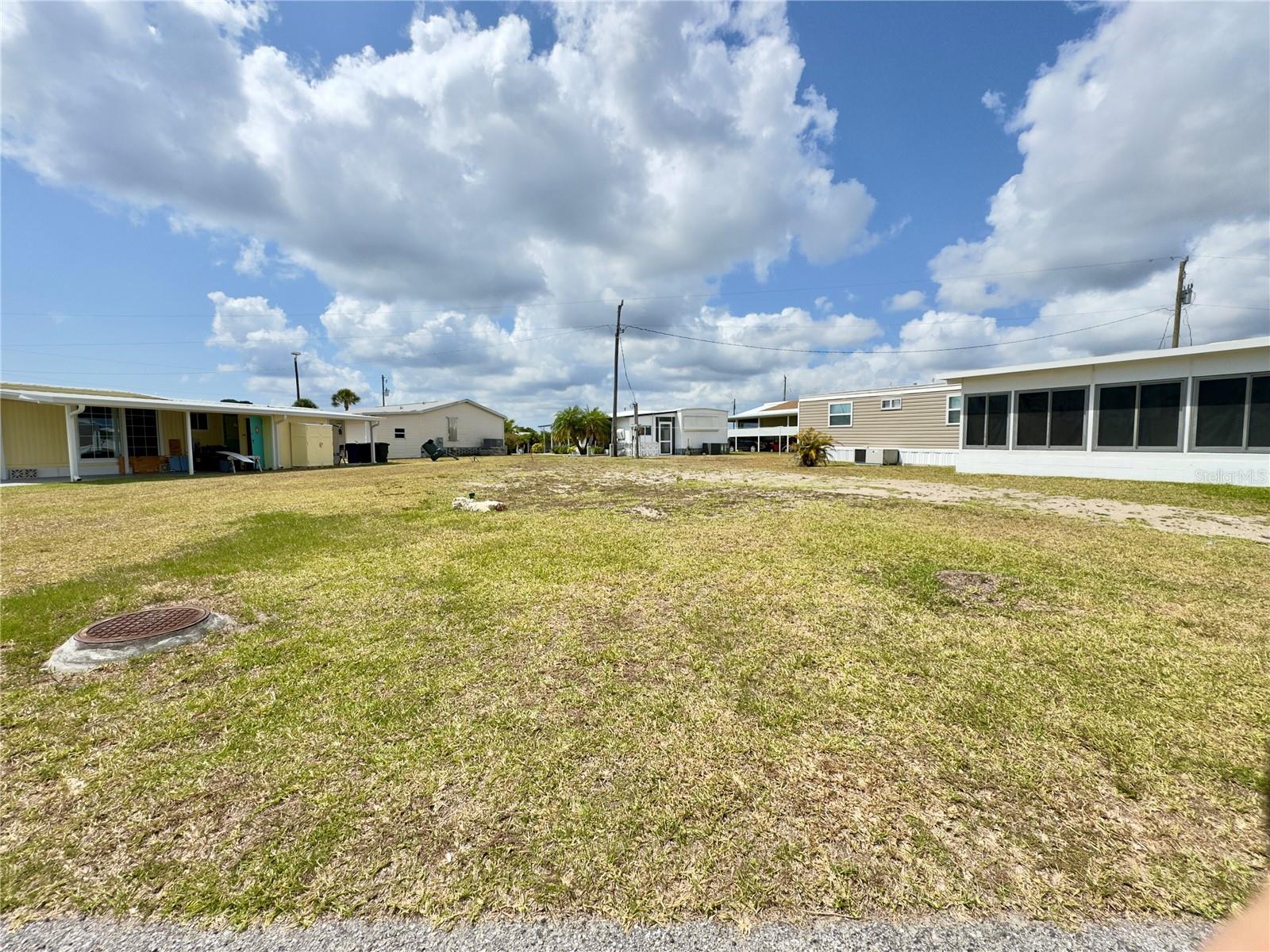 Cleared Lot ready for a new home! Close to clubhouse, marina, pool. Enjoy Florida's Retirement Lifestyle at an affordable price. Harbor Cove is a desirable 55 and up waterfront community that has everything you need to enjoy paradise. Harbor Cove has two heated pools, hot tubs, tennis courts, shuffleboard, pickleball, horseshoes, water aerobics, fitness classes, art classes, woodworking, golf cart parades, bingo, and dances. Boat clubs, a craft room, picnics on the patio, golf clubs, bowling clubs, and much more. There is plenty of wildlife to enjoy in this 190-acre community; herons, egrets, cranes, ibis, parrots, even alligators and manatees! Conveniently located within minutes of Downtown Wellen Park, Costco, shopping, restaurants, and a short drive to beautiful Gulf Beaches. Enjoy world-class amenities minutes away at the new Sunseeker Resort on Charlotte Harbor; restaurants, bars, spa, a championship golf course, and more. Allegiant Airlines provides nonstop flights into Punta Gorda (PGD) and Sarasota (SRQ) from 50+ destinations. Enjoy true Florida living; Hiking, biking, hunting, swimming, shelling, boating, fishing, bird watching, and beyond.