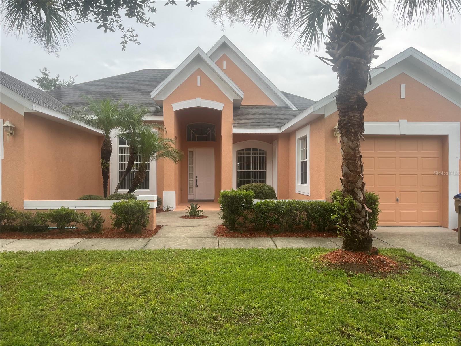 Beautiful single family home located in the picturesque and gated Kissimmee Bay Golf Course Community, a wooded enclave on the shores of Lake Toho. Walk into the spacious living area with a formal living room, separate dining room and large family room. The large eat in kitchen has all stainless steel appliances, wood cabinets, pantry, breakfast bar and is open to family room for easy entertaining. Sliding doors from the living room to a covered lanai and screened in pool, overlooking the golf course. The home features a split bedroom plan, with the master suite having two walk in closets, bath with dual sinks, shower and garden tub. There are two additional bedrooms, two full bathrooms and a den/office conveniently located just off the foyer. You have an inside laundry room and two separate garages for a total of 3 spaces. House has been freshly painted and all new carpet installed.
Kissimmee Bay is a stunning community with fantastic amenities, including a marina, tennis courts, RV storage, fishing and private access to Lake Toho through the community boat ramp. Perfect for enjoying outdoor activities, including boating and fishing. Minutes from theme parks, shopping, dining and major highways.
