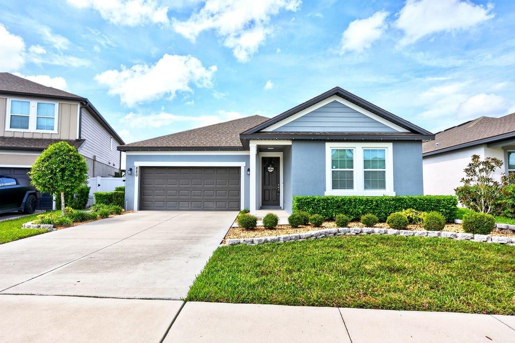 Photo of 880 Livestock Loop, Saint Cloud, FL 34771 (MLS # O6449961)