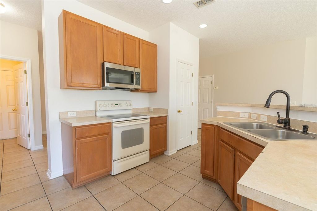 Photo of 7720 Bear Claw Run, Orlando, FL 32825 (MLS # O6394562)