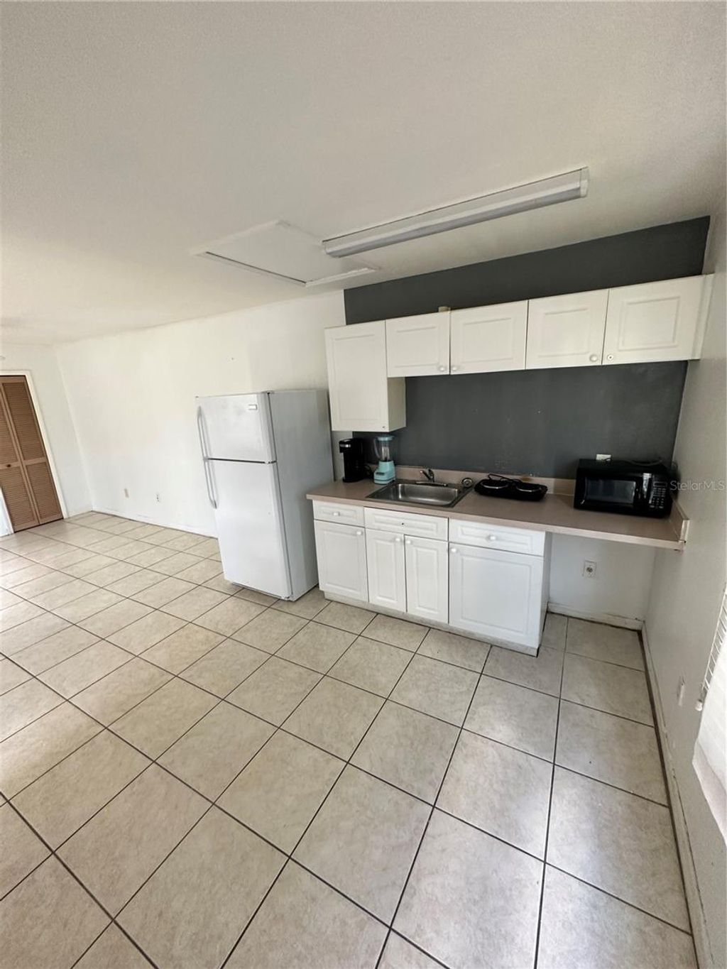 Photo of 235 Mango Drive #B, Davenport, FL 33897 (MLS # S5142078)