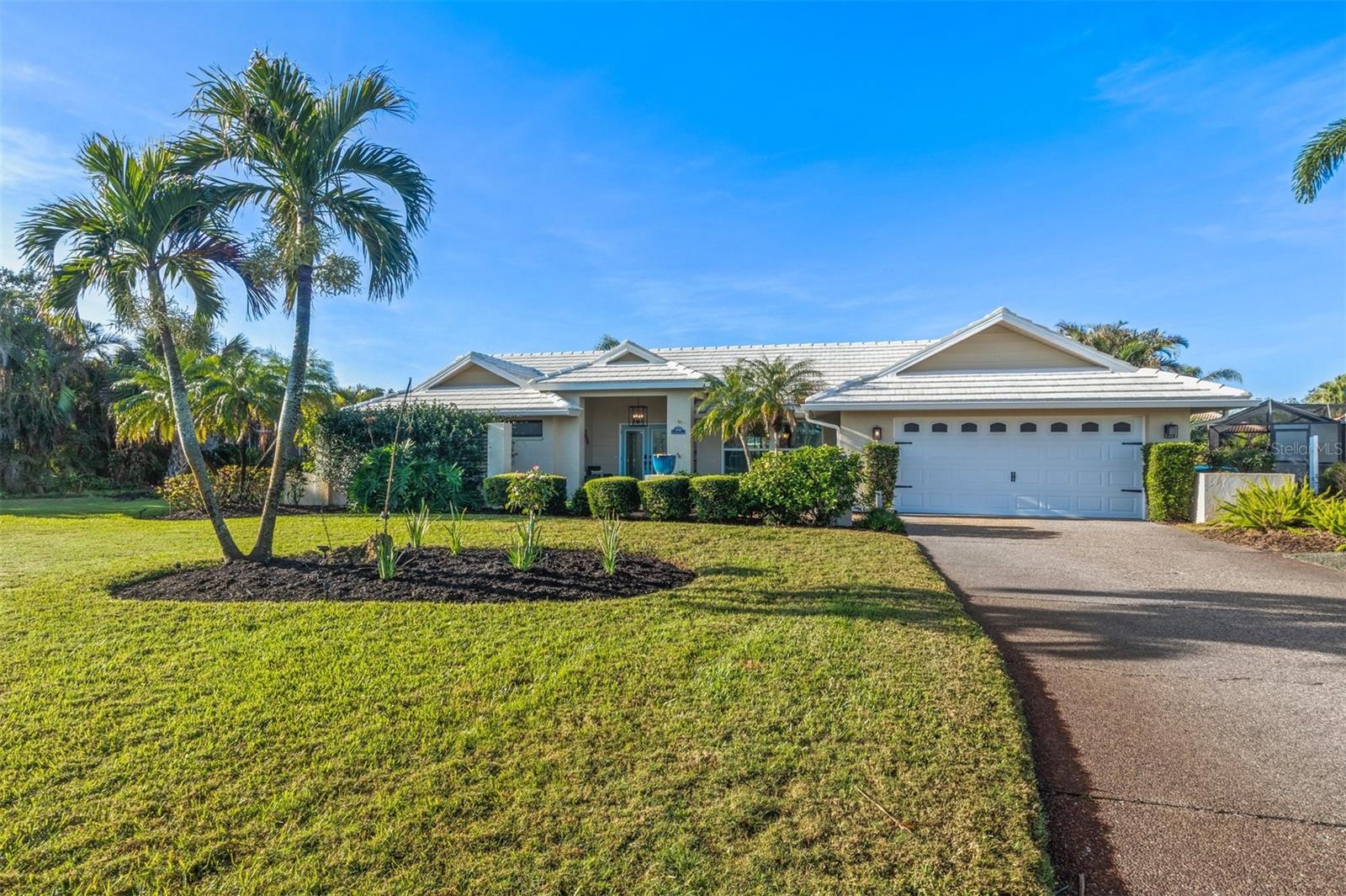 Tucked away in the desirable, active, and friendly community of Englewood Isles, this stunning (furnished) single-story 3-bedroom, 2-bathroom POOL home is a private oasis situated on over a quarter-acre at the end of a quiet cul-de-sac and featuring EXCLUSIVE BEACH CLUB rights. As you arrive, lush landscaping frames the home’s charming tile roof, while over 2,300 square feet of living space welcome you inside. RECENT UPDATES include: newly refinished, HEATED, salt-water pool to enjoy year round, NEWER HVAC, newer water heater, front door, and garage doors. Step through the new double front doors into the foyer, where a formal dining room and a spacious Florida room await, complete with built-in cabinets and a work desk—ideal for a home office or study. The family room is a showstopper, boasting a custom coffered ceiling with beams and accent panels, a wet bar perfect for entertaining, and pocket sliding doors that seamlessly blend indoor and outdoor living. Many windows throughout the home have been upgraded to impact-resistant glass and outfitted with motorized blinds for convenience and peace of mind. The updated kitchen is a chef’s dream, featuring granite countertops, stainless steel appliances, a mosaic tile backsplash, and a cozy breakfast nook. The owner’s suite offers a serene retreat with its own sliding door leading to the lanai, a spa-like ensuite bathroom with dual sinks, a large walk-in closet, and a separate soaking tub. The guest wing, separated by a pocket door for added privacy, includes two spacious bedrooms with walk-in closets, one of which opens directly to the lanai. The guest bathroom doubles as a convenient pool bath, enhancing the home’s functionality. The indoor laundry room provides ample storage, while the screened-in lanai becomes the heart of outdoor living. Centered around an oversized inground pool and surrounded by tropical landscaping, this space offers unmatched privacy for relaxation or entertaining. For those seeking additional perks, homeowners have the option to join the exclusive Englewood Gardens Beach Club for just $125/year. Membership includes private beach access, free parking, private bathrooms, picnic areas with gas grills, and more on picturesque Manasota Key. This home is perfectly located to enjoy the best of the Gulf Coast lifestyle. Nearby, the Englewood Sports Complex offers premier facilities, including fields, courts, playgrounds, a gymnasium, and a fitness room. Nature lovers will appreciate the proximity to Myakka State Forest, where outdoor adventures like hiking, biking, horseback riding, and wildlife viewing await. Just minutes from shopping, dining, golf, and entertainment, this home truly offers something for everyone. This turn-key home is Florida living at it's best and a MUST SEE in the fun loving town of Englewood, perfectly positioned between Sarasota and Fort Myers. Also, recently featured in Southern Living magazine as a TOP 10 town for retirement. Don’t miss your chance to experience this slice of paradise—schedule your private showing today!