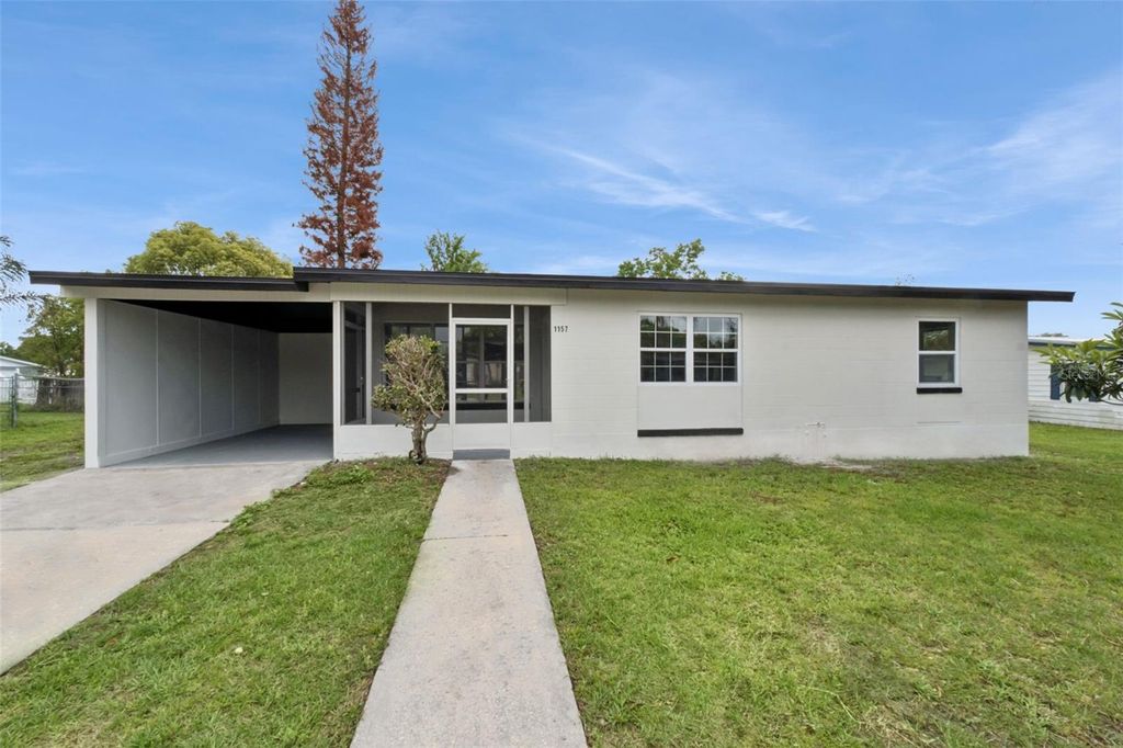 Photo of 1157 Hampshire Avenue, Deltona, FL 32725 (MLS # O6397439)