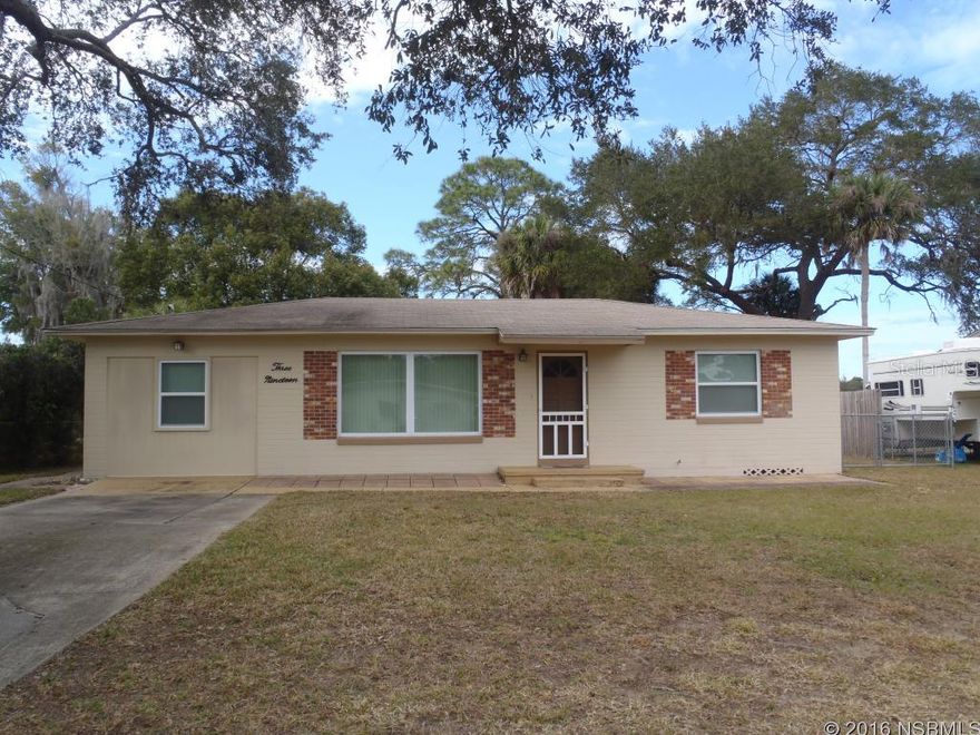 Move in ready concrete block home in quiet neighborhood.  Updated windows 2012.  Freshly painted interior.  Room for RV or Boat parking in large fenced back yard with double gate access.  Water view of the pond. ;Water: City
