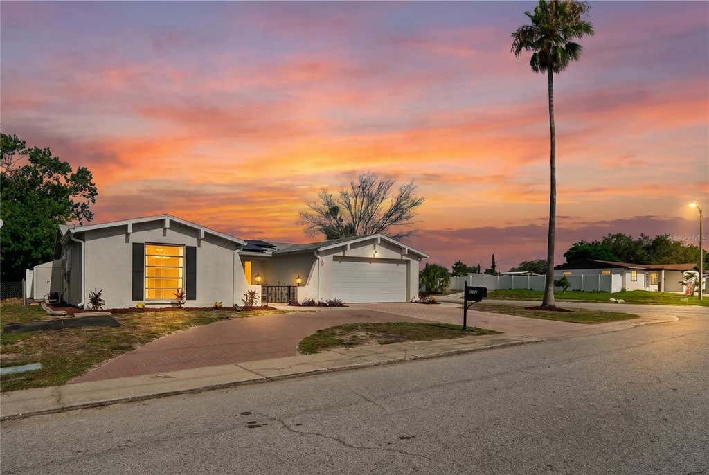 Photo of 9205 Gray Fox Lane, Port Richey, FL 34668 (MLS # TB8520629)