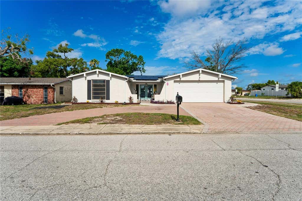 Photo of 9205 Gray Fox Lane, Port Richey, FL 34668 (MLS # TB8520629)