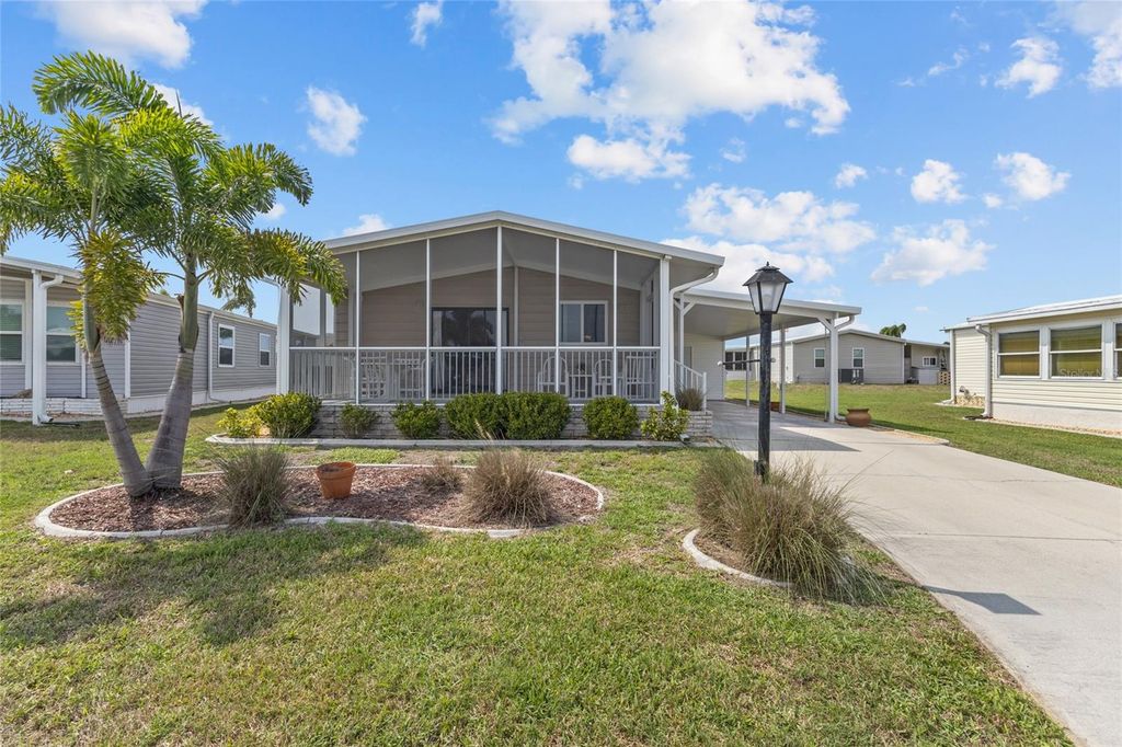 Photo of 611 La Jolla Circle, North Port, FL 34287 (MLS # N6143558)