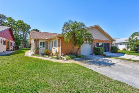 Photo of 3210 Mcmath Drive, Palm Harbor, FL 34684 (MLS # TB8358540) Photo of 3210 Mcmath Drive, Palm Harbor, FL 34684 (MLS # TB8358540)