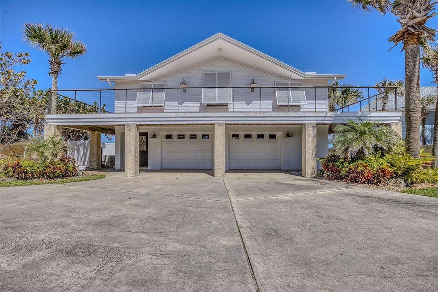Oceanfront 4BD /4BA home with a full wraparound deck for sunbathing, wave watching and entertaining on Van Kleeck Drive in New Smyrna Beach. Located directly on the No Drive Beach. Private elevator. Enormous dining room for all your family gatherings. Vaulted ceilings and a natural gas stone fireplace for those chilly beach days. Gourmet kitchen with Quartz counter-tops open to living and dining room. Kitchen appliances include range, refrigerator, dishwasher, and separate ice maker. Lots of windows to take in the ocean views and that priceless natural light! Upstairs laundry area. Private Composite decking and private walkover to the beach. Motorized blinds on main windows. Oversized 2 car garage with loads of space to store your cars, golf cart, beach toys and more, along with full bath and ample storage room. New A/C in 2020, tankless gas water heater 2018, new roof 2018, whole house generator 2023, Elevator 950 lbs. capacity. Hurricane Shutters. A general maintenance plan is in place for the generator and the A/C.