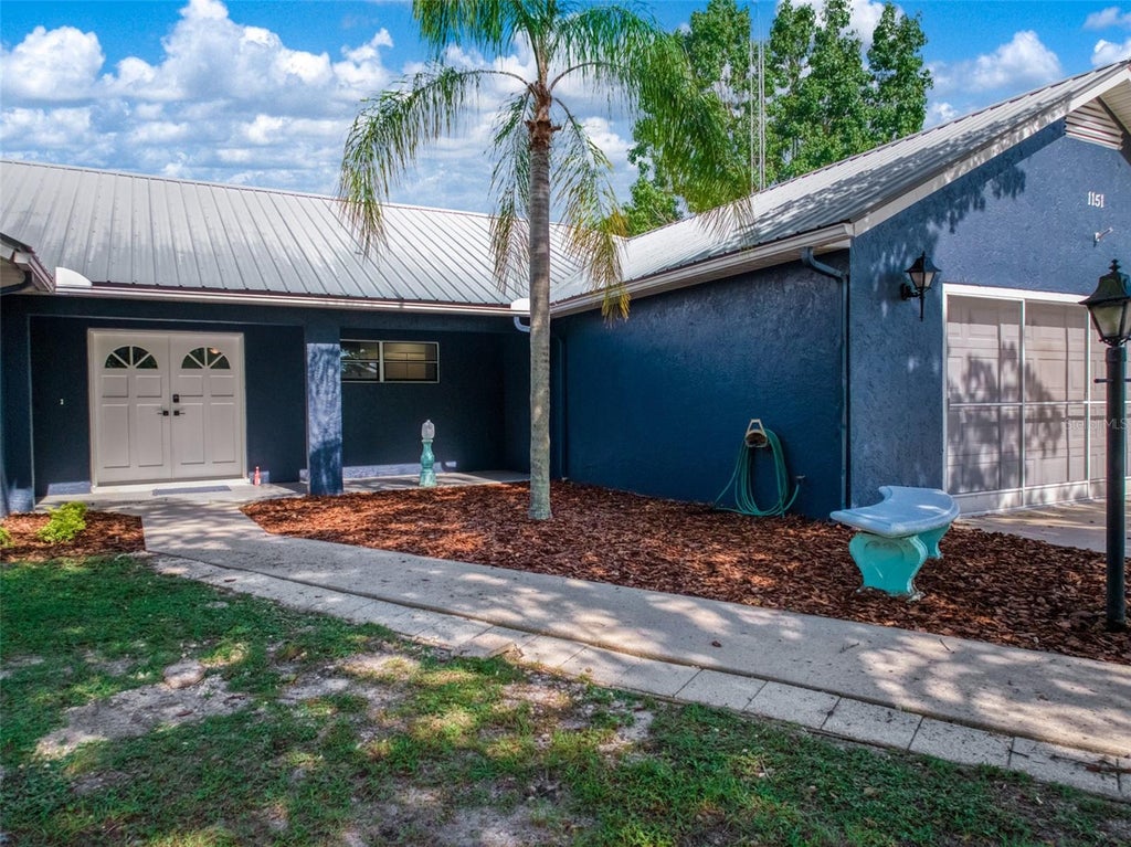 Photo of 1151 Winter Green Street, Lake Placid, FL 33852 (MLS # FC321362)