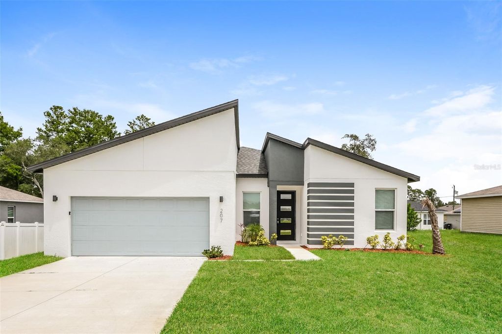 Photo of 207 Gladiola Court, Kissimmee, FL 34759 (MLS # TB8504980)