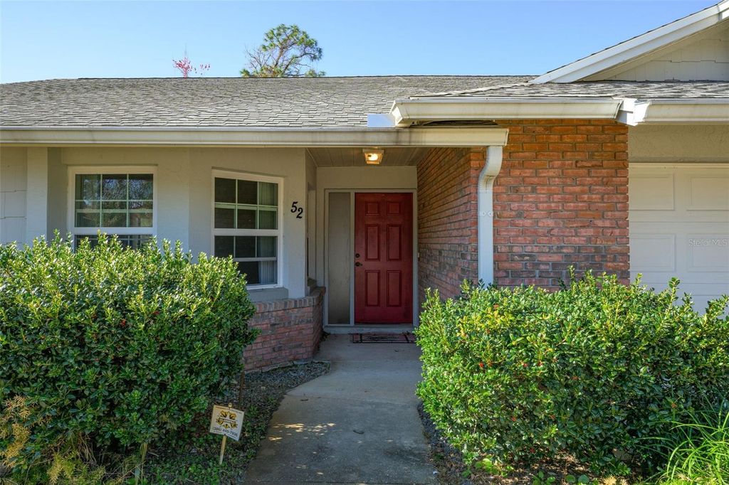 Photo of 52 Wynnfield Drive, Palm Coast, FL 32164 (MLS # FC315881)