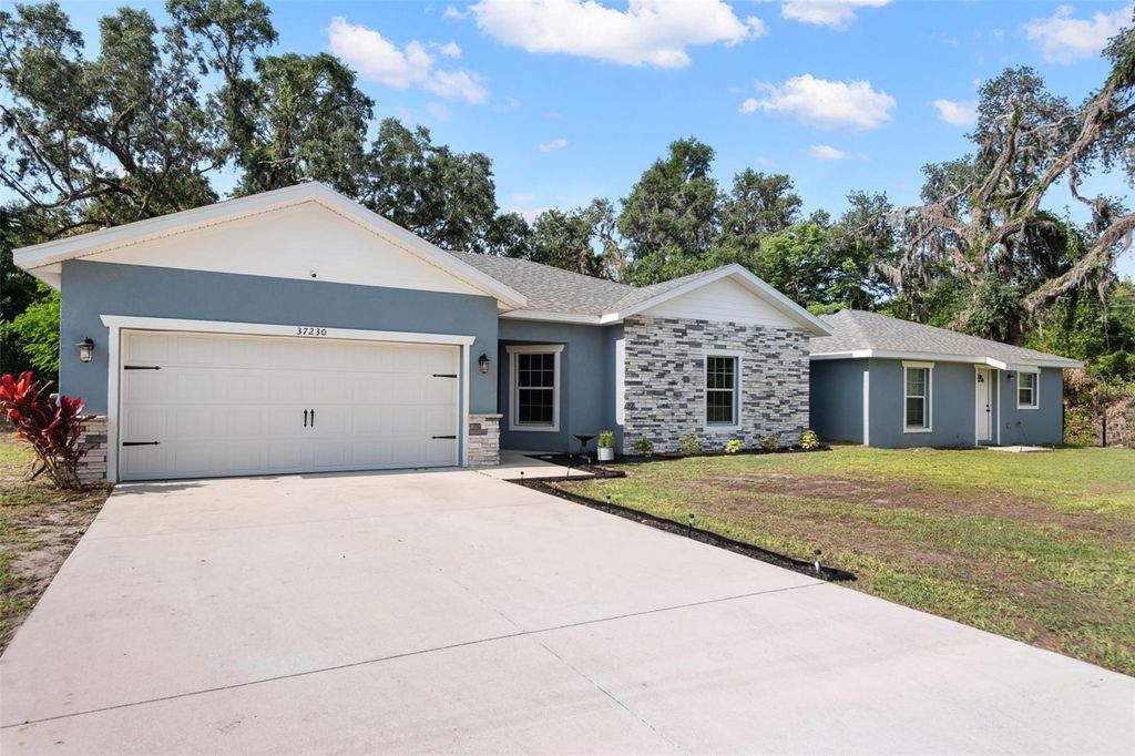 Photo of 37230 Poinsettia Avenue, Dade City, FL 33525 (MLS # TB8386264)