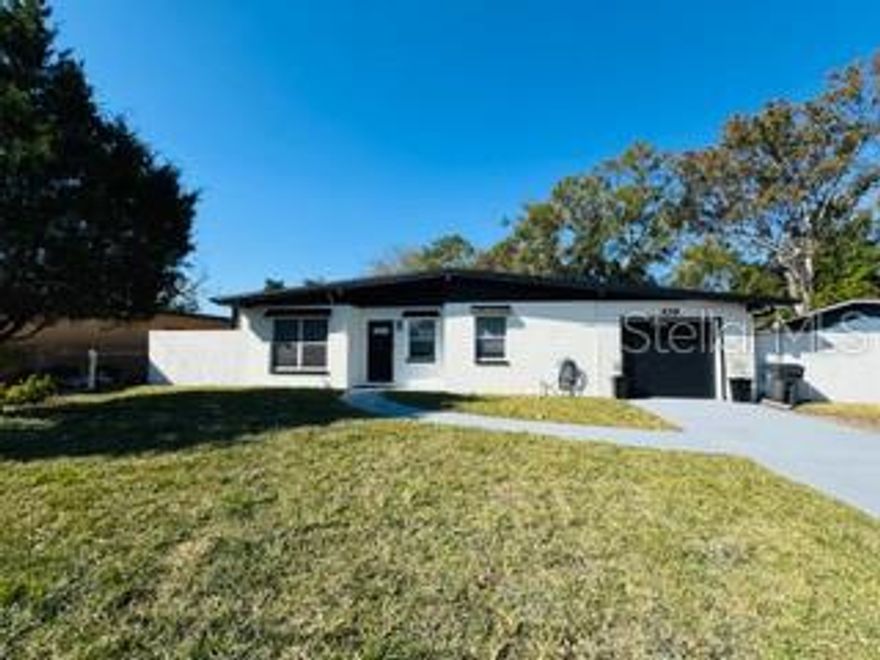 Nestled in the highly deisrable City of Oldsmar, this home has been tastefuly renovated. You'll love the updated kitchen with new stainless steel appliances, stone counter top and lovely build in desk. This modern kitchen has beautiful black cabinets, double sink, new range, refrigerator, dishwasher, and microwave. There are new ceiling fans throughout the home and plenty of decorator lighting. The master suite has it's own bath and modern shower. It is a beauty. The secondary bath is very modern with decorator fixtures and lighted mirror, all done very tastefully. This shower has beautiful ceramic tile and modern features. There is spacious great room and separate dining room which is leading to the perfect entertaining back yard. There are 2 decks, brick pavers and it features a jacuzzi tub. You'll love the separate shed for storage and fenced in yard.  There is plenty of room for your toys with gated entry to the back yard. No CDD or HOA fees here but there are several parks and a boat ramp in the neighborhood. Move in ready and a must see.