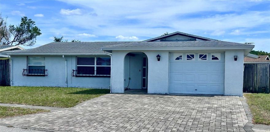3BR/2BA Home with Pool & Privacy
Well-maintained 3-bedroom, 2-bath home with 1,410 square feet of comfortable living space, complete with a 1-car garage and a versatile Florida room for relaxing or entertaining year-round.
Situated on a large corner lot, the property features a privacy-fenced backyard—great for pets, gatherings, or simply enjoying your own outdoor retreat. Take a dip in the lanai-enclosed pool, with a perfect balance of sunshine and shade while keeping bugs at bay.
Conveniently located to public schools, this home is also just minutes from charming downtown New Port Richey and easy access to major roadways for easy commuting—yet tucked away in a quiet, established residential neighborhood.
>3 Bedrooms /  2 Bathrooms   
>1,410 Sq ft living space
>Easy-care tile & laminate flooring
>Florida room
>Pool & Lanai in Large Privacy-Fenced Backyard
>New Windows and Air Conditioning
>No flood zone & No HOA
>Underground utilities
>Walkable to Schools
>Close to charming & quaint downtown New Port Richey shops & restaurants
>Quiet Family Neighborhood with Easy Access to Main Roads

This perfect blend of comfort, convenience, and outdoor living could be your new home.