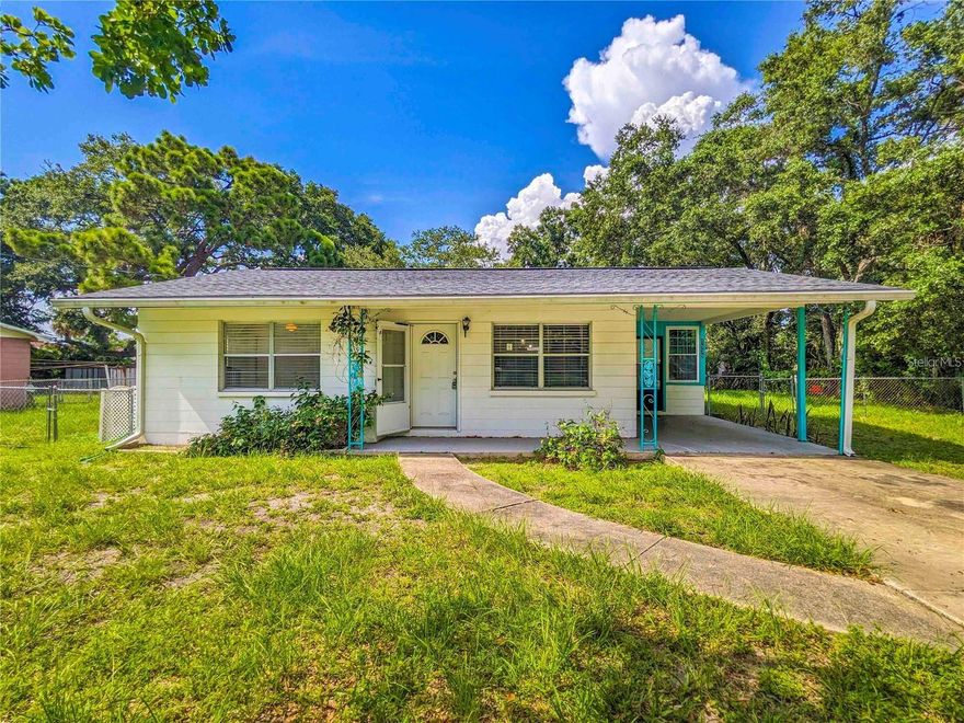 Welcome to this inviting 2-bedroom, 1-bath home featuring a spacious, fully fenced backyard and a central Sarasota location that offers both comfort and convenience. The interior is bright and welcoming, with a functional layout designed for everyday living. Just off the kitchen, an enclosed Florida room with swinging French doors and surrounding windows provides abundant natural light, making it an ideal space for a home office, relaxation area, or additional living space. The home offers two comfortably sized bedrooms and a full bathroom with a tub/shower combination. Additional features include a one-car carport and a private storage closet located at the rear of the home. Conveniently located near schools, churches, shopping, and dining, this home also provides easy access to Sarasota’s beautiful beaches, shopping centers, and recreational activities—perfect for enjoying the Florida lifestyle.