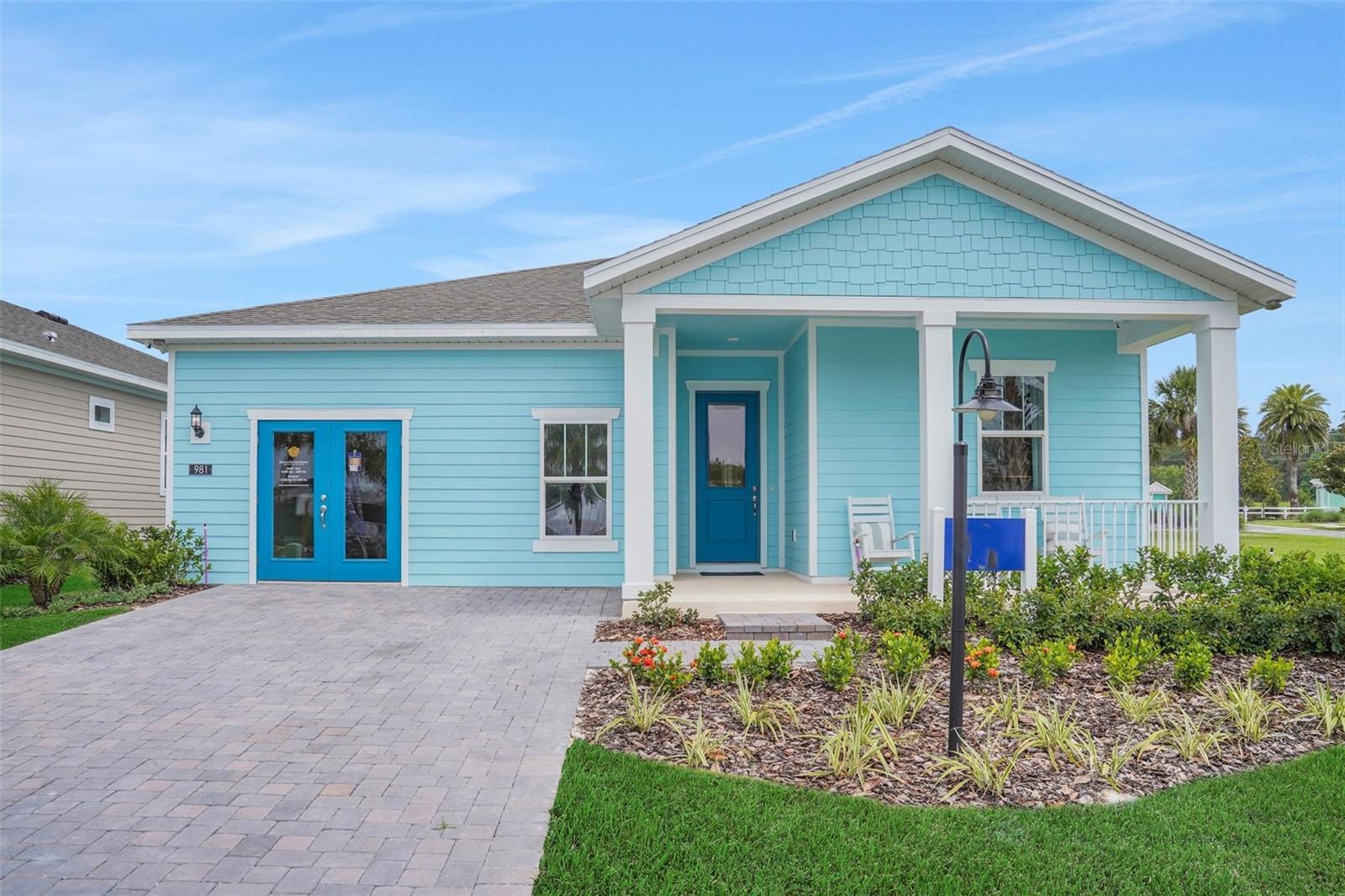 One or more photo(s) has been virtually staged. Under Construction. Charming Key West Style Edison Plan – 2BR/2BA + Flex Room with Designer Finishes
Welcome to this beautifully crafted Edison floor plan, offering 2 bedrooms, 2 bathrooms, and a versatile flex room, perfect for a cozy study or home office. This Key West-inspired home boasts an open and airy kitchen, living, and dining area, featuring elegant 5.25-inch baseboards, 8-foot interior doors, and upgraded plank wood-look tile flooring throughout.
The gourmet kitchen is designed for both functionality and style, equipped with stainless steel appliances, an enlarged center island with quartz countertops, stained quill cabinetry, and 42” linen upper cabinets along the perimeter. A butler’s pantry provides additional storage and prep space, perfect for entertaining.
Natural light fills the home through the expansive 12-foot sliding glass doors, leading to a covered lanai ideal for outdoor relaxation and gatherings.
The private primary suite offers an oversized walk-in closet and a luxurious spa-inspired shower complete with a bench seat. Additional highlights include a spacious 2-car garage, a large laundry room, and a pavered driveway and walkway that add to the home’s curb appeal.
This home seamlessly blends modern design with everyday comfort—schedule your private tour today!