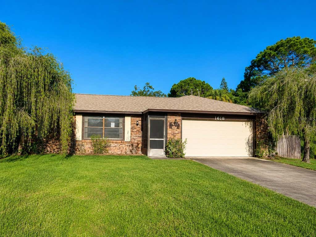 Photo of 1618 Givens Court NW, Palm Bay, FL 32907 (MLS # O6433844)
