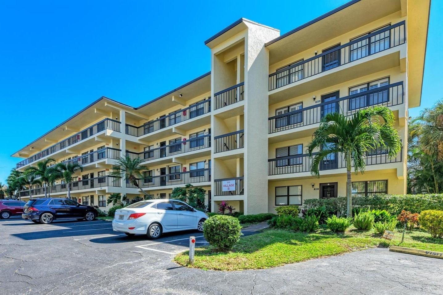 TURNKEY CONDO WITH LAKE VIEW AND COVERED PARKING! Welcome to your serene oasis in the heart of Bradenton's vibrant 55+ community at Desoto Square Villas! This meticulously maintained 2-bedroom, 2-bathroom condo on the 3rd floor offers beautiful lake views and a lifestyle of leisure. As you step inside, you'll immediately notice the impeccable attention to detail. The condo boasts new floors throughout, creating a seamless flow from room to room. The recently renovated kitchen shines with modern elegance, featuring some new appliances (refrigerator and microwave) and ample cabinet space, perfect for the culinary enthusiast. Relax and unwind in the spacious living area, bathed in natural light pouring in through the windows. Step out onto the private balcony to enjoy your morning coffee or evening cocktails while soaking in the peaceful atmosphere and picturesque views. Both bedrooms offer comfortable accommodations, with the master bedroom boasting its own ensuite bathroom for added convenience and privacy. This condo comes FULLY FURNISHED, ensuring a hassle-free move-in experience. COVERED PARKING adds to the convenience, protecting your vehicle from the elements year-round. Laundry unit and personal storage unit are conveniently located on the same floor by the elevator. Desoto Square Villas is renowned for its array of amenities tailored to an active lifestyle. From the sparkling heated swimming pool and fitness center to tennis courts, shuffleboard and clubhouse (billiards, pool tables, outdoor grills, etc.), there's always something to keep you entertained and engaged. And with gated security, you can enjoy peace of mind knowing that your community is safe and secure. Anna Maria Island is 11 miles away, Bradenton Beach and SRQ Airport are 9 miles away and only 2.5 miles to the Bradenton Riverwalk where you can experience plenty of dining and shopping options. Don't miss the opportunity to make this beautiful condo your new home. Schedule your showing today and experience the best in 55+ living at Desoto Square Villas! ***All room dimensions and HOA restrictions must be verified by the buyers.***