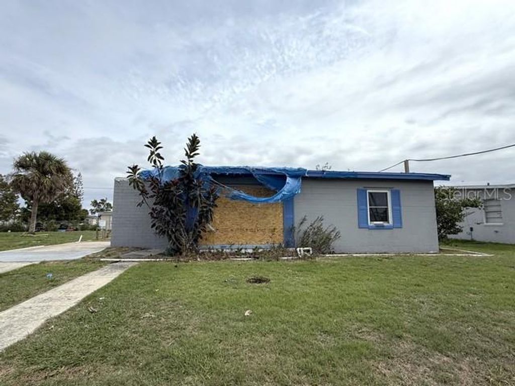 Photo of 21661 Augusta Avenue, Port Charlotte, FL 33952 (MLS # C7523495)