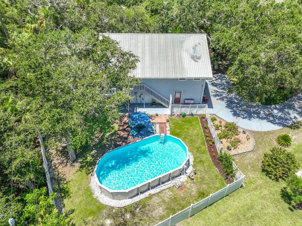 Photo of 26 Beachside Drive, Palm Coast, FL 32137 (MLS # FC311835)