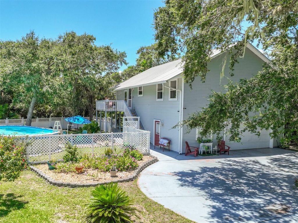 Photo of 26 Beachside Drive, Palm Coast, FL 32137 (MLS # FC311835)