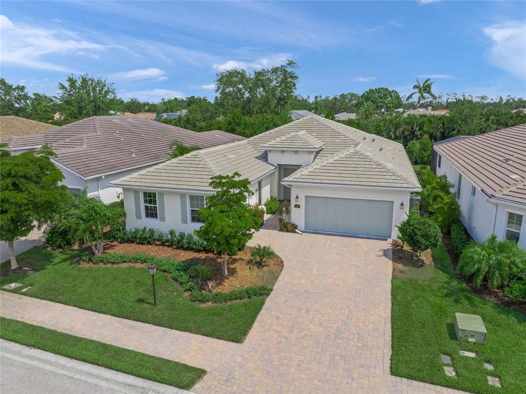 Photo of 7717 Sandhill Lake Drive, Sarasota, FL 34241 (MLS # A4652548)