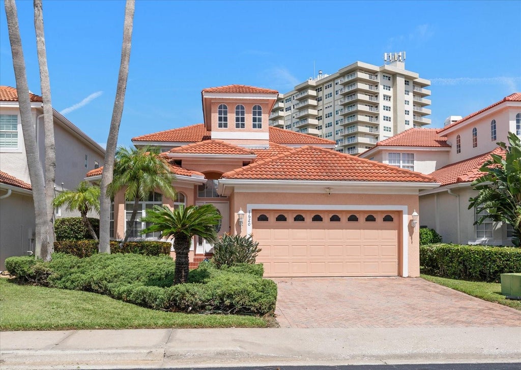 Photo of 1620 Sand Key Estates Court, Clearwater Beach, FL 33767 (MLS # TB8535137)