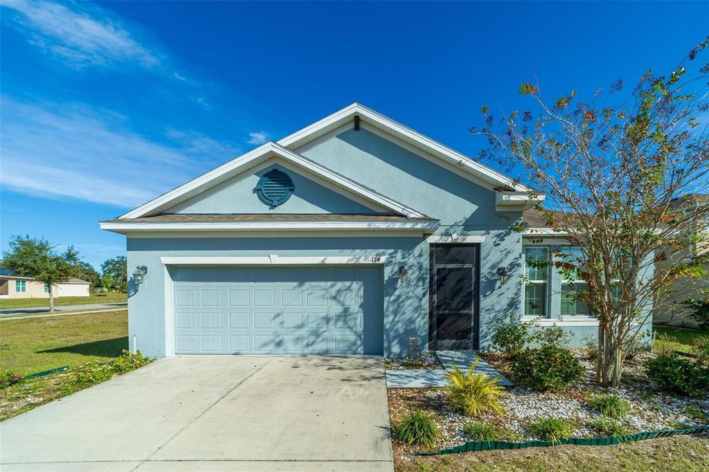 Photo of 174 Tracy Circle W, Haines City, FL 33844 (MLS # O6361084)