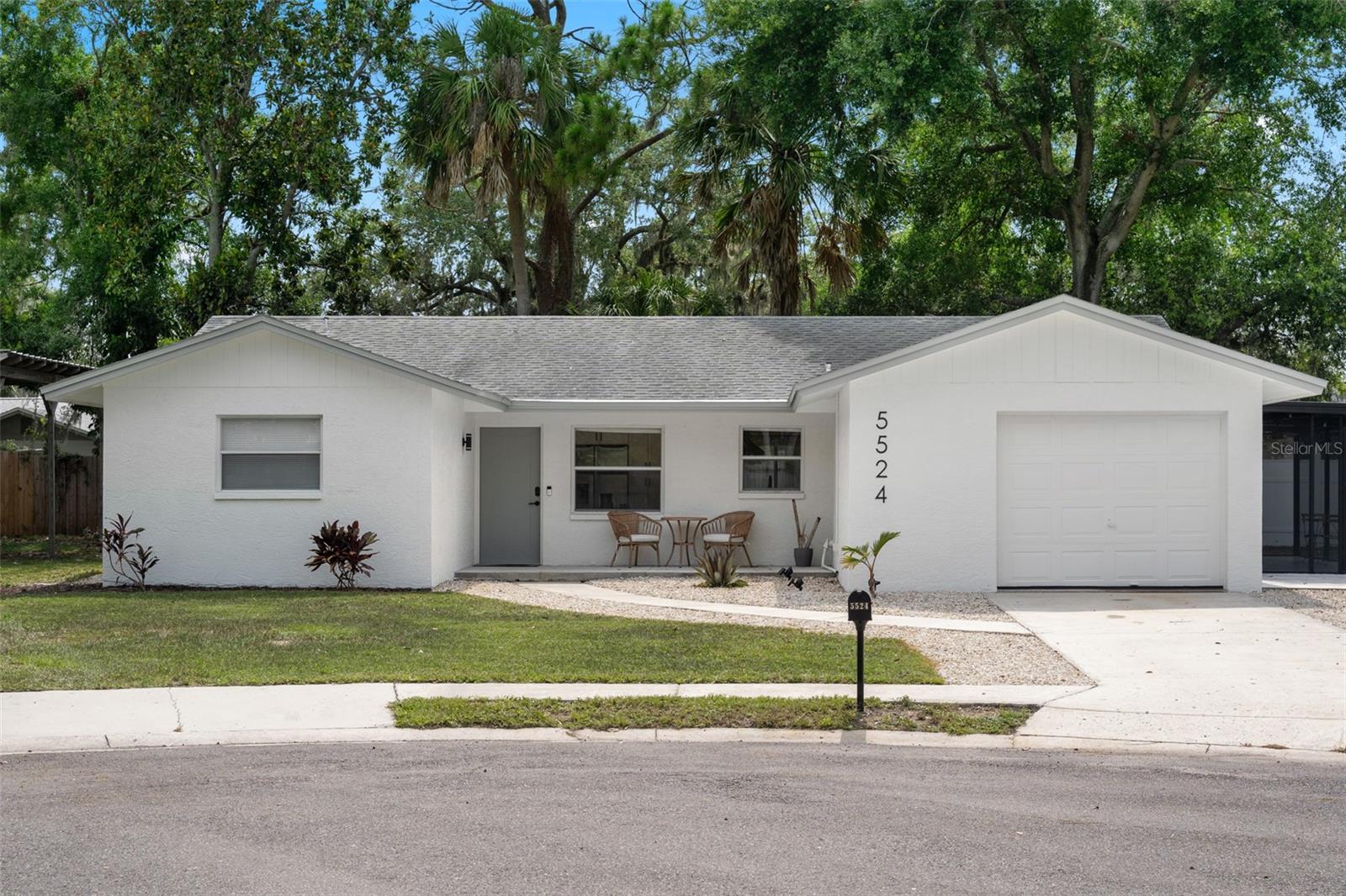 Welcome home! This renovated house is ready for you to call it home and comes with a brand NEW ROOF. This Sarasota ranch house boast 2,052/sq.ft. of living and fun spaces, 3 bedrooms with a split floorplan, open concept in the main areas of the home. Oversized 1 car garage with epoxy floor. Double bay RV port, HUGE 12,613/sq.ft. lot with room for a pool, no HOA, no CDD's, not in a flood zone, which means lower monthly bills. Ridgewood Estates are located right off of exit 207 - Bee Ridge so commuting to work is a breeze, Siesta Key is only 5.8 miles away.