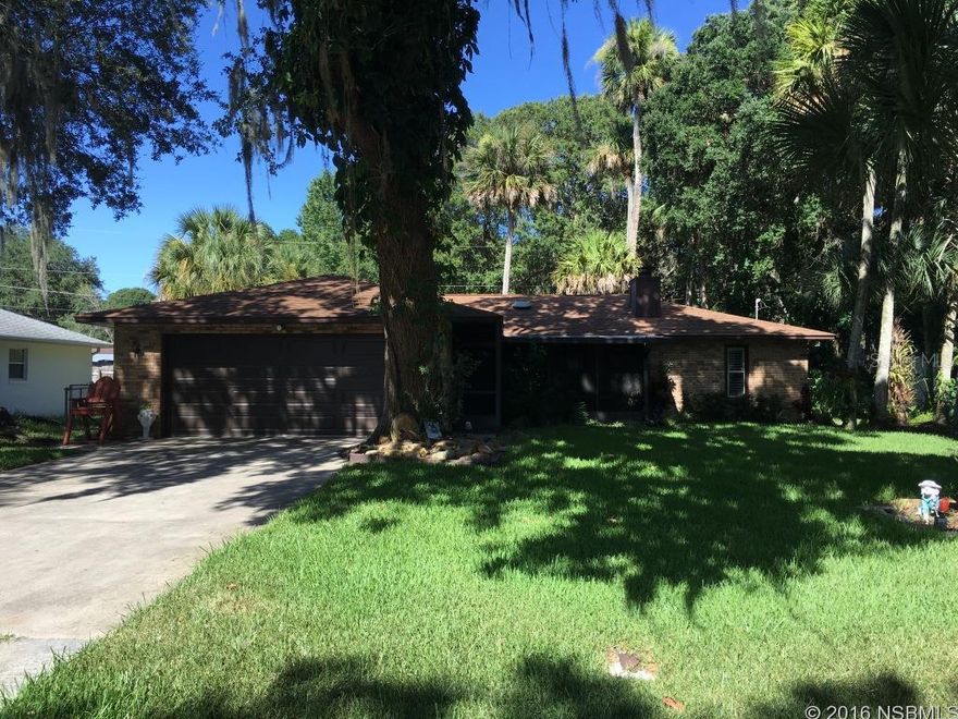 Very nice 3 bedroom, 2.5 bath single family home in Edgewater!Featuring a 2-car garage, 1600 sq feet of living space, a formal living room, dining area, a gorgeous fireplace, ceramic tile, hardwoods, plantation blinds and a kitchen made for entertaining with granite counters, double wall ovens, microwave, large french door refrigerator, and breakfast bar. There's also a den, a beautiful deck out back, and a fenced yard on a large shady lot. This gem is located in a quiet neighborhood, close to schools, shopping, access to I-95, parks on the intercoastal river, library.Please note the home will be rented UNFURNISHED, with washer and dryer hook ups only (no machines) and utility sink in laundry room. Pets may be accepted, breed restrictions and fees would apply.Contact the management team for more information.