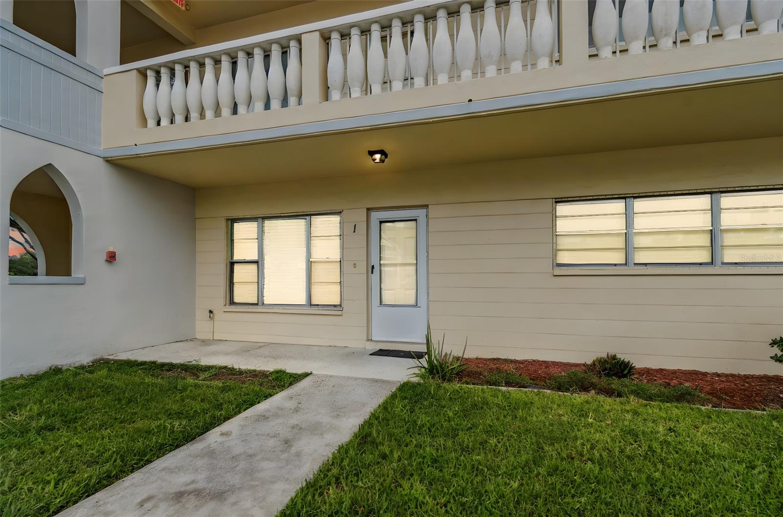 You will be On Top of the World in this updated two bedroom two bath end unit condo located West of Belcher road nestled in the back. The spacious, open floor plan has luxury vinyl throughout. The large open kitchen/family room combo features a pantry, solid surface counters, stainless steel microwave, dishwasher and range, and solid wood cabinetry. The family room has built in shelves and cabinets for convenient access to books and electronics and the back door opens to your fenced patio with a garden view. AC was new in 2022. On Top of the World is the area's premier amenity rich community for 55+ relaxed living. This pet friendly community has tennis, golf, shuffleboard, fitness center, pool, library, planned activities, Good Karma Cafe and a dog park all conveniently located for your enjoyment. Nearby you will find shopping and restaurants and in under 20 minutes you can be on the sparkling sand of our famous Gulf Beaches. Property will transfer via leasehold deed and requires court approval.