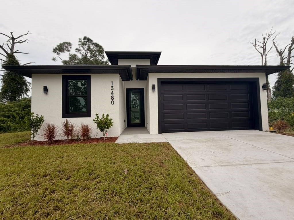 Photo of 13480 Drysdale Avenue, Port Charlotte, FL 33981 (MLS # C7532173)