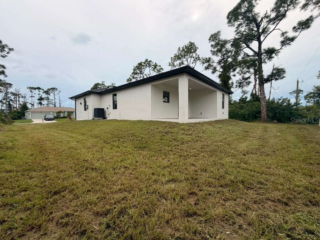 Photo of 13480 Drysdale Avenue, Port Charlotte, FL 33981 (MLS # C7532173)