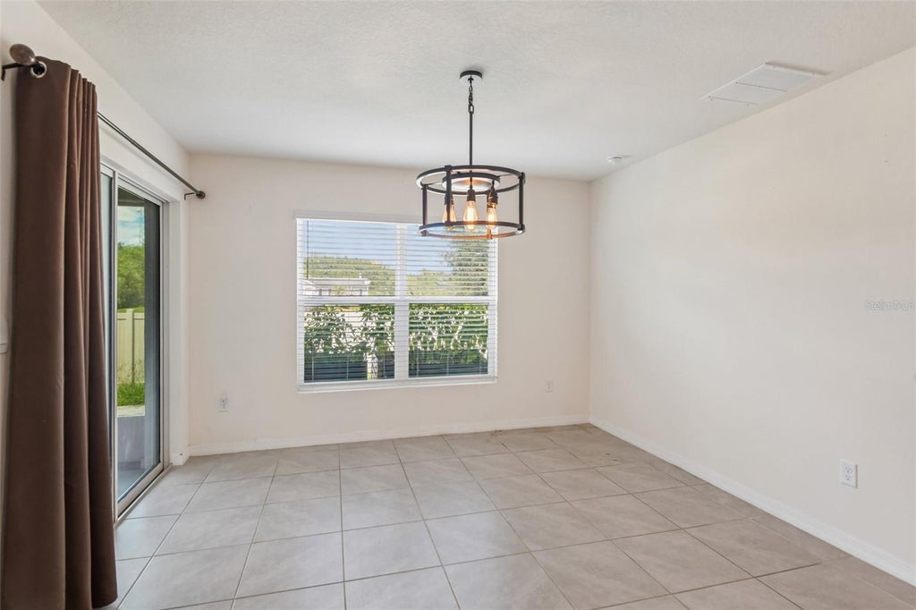 Photo of 36945 Goffaux Loop, Zephyrhills, FL 33541 (MLS # TB8544319)