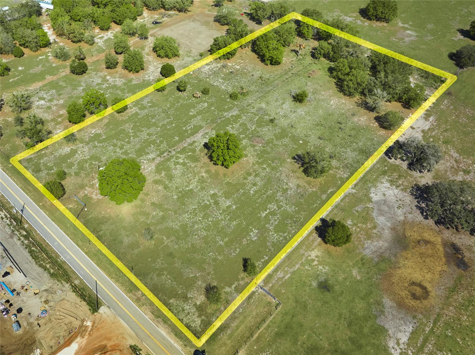 Don't miss out on this exceptional opportunity to bring your dream home to life on this lovely 5.0 5 acre parcel. With no HOA fees and a convenient location, you'll enjoy a short commute to shopping, restaurants, and schools. This wonderful property offers ample space and privacy for your future home, allowing you to create a sanctuary that suits your needs. This 5+ acre parcel offers the flexibility to design and build according to your preferences. We recommend that the buyer conducts their due diligence with the city and/or county to familiarize themselves with any building restrictions and requirements. Parcel improvements include a 150 ft deep well, 12x16 shed, gated entrance and a fenced in lot. Take advantage of this exceptional property and turn your vision of a dream home into a reality.