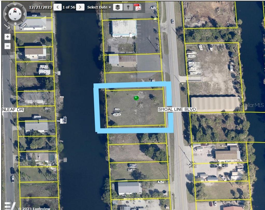 WORK & PLAY in beautiful Hernando Beach, FL. This double lot (.42 acres) is zoned C2 offering countless possibilities! Very few lots in Hernando Beach have this flexible zoning designation! Boat repair, welding shop, marine supply store, bait shop, retail, Bed & Breakfast, triplex, you name it! The wide and deep canal offers indirect Gulf access. This unique property has been priced to SELL.
The Owner was planning to build a Live/Work unit consisting of a 3,000 sf warehouse with a 900 sf residential unit on the 2nd floor for one bedroom, bath/laundry room, galley kitchen and great room. Site specific plans are IN HAND and may be negotiated with the property if you're interested. When building on the canal you are required to meet Southwest Florida Water Management (SWFWMD) requirements and FEMA regulations. Completed plans were prepared by a local Civil Engineer and meet all requirements of both SWFWMD and FEMA including water run-off, pavement to green space ratio, parking requirements, etc. By building as an owner occupied Live/Work unit (per Hernando Building Code) some flexibilities are a major advantage, for example - as a residential property, you can be your own contractor, homestead the property for lower property taxes, avoid handicap requirements and fire sprinklers normally required for commercial builds. The property already has an address of 3341 and 3345 Shoal Line - One address for Business and one for Residential. You are not assigned an address for a vacant lot until you have completed building plans and submit them along with your request for an address. The complete building package is ready to go to permitting for review by Hernando County for approval if these site specific plans are of interest to you.