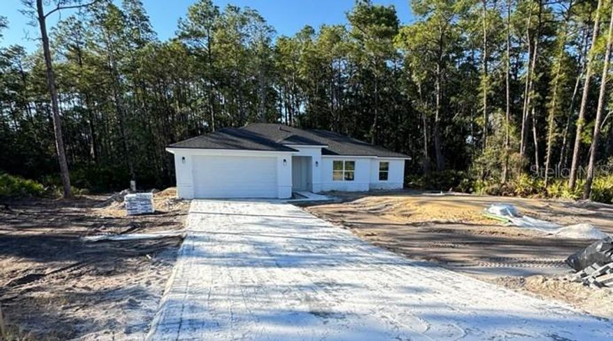 Under Construction. NEW CONSTRUCTION ON 1 ACRE – HORSES ALLOWED – BACKS TO 78 ACRES OF STATE LAND – READY IN APPROXIMATELY 30 DAYS!

Beautiful new construction home in the desirable Royal Trails community, set on a spacious 1-acre lot and designed to give the perfect blend of modern comfort and peaceful country living. This RV-friendly community with deeded access to Lake Norris provides space, privacy, and a relaxed rural lifestyle while remaining conveniently located near everyday amenities.

This thoughtfully designed residence features 4 bedrooms, 2 bathrooms, and a bright open-concept floor plan ideal for everyday living and entertaining. The kitchen will showcase modern finishes and quality upgrades, opening seamlessly to the main living area. Waterproof luxury vinyl flooring throughout the main areas adds both style and durability.

Royal Trails offers a unique rural lifestyle with convenient amenities, including deeded access to Lake Norris, a community park, playground, pavilion, and approximately 26 miles of roads for walking and biking. Zoning allows up to two horses pr acre, and RV and motorhome parking are permitted once the home is completed.

Surrounded by the Ocala National Forest and Seminole State Forest, this property also backs to approximately 78 acres of state-owned land, providing exceptional privacy and a beautiful natural backdrop with no rear neighbors. Yet it remains conveniently located near Eustis, Mount Dora, Deland, and Lake Mary, with easy access to the Wekiva Parkway and SR-429. Beaches, Orlando attractions, and both Orlando and Daytona International Airports are about an hour away.

A rare opportunity to own new construction on acreage in Royal Trails. Schedule your showing today.