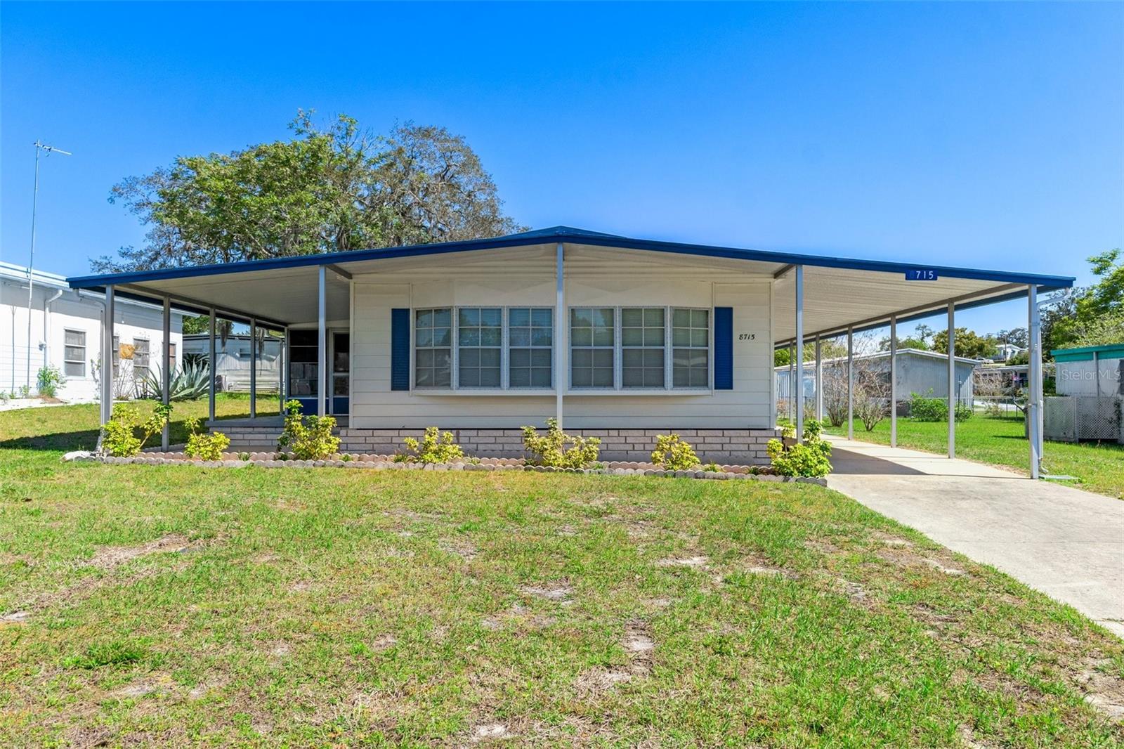 Welcome to this retreat from the daily hustle and bustle. Located in the sought after 55+ community, where you own the land!! Highpoint offers a community pool, shuffleboard, tennis courts and much much more. This charming residence offers a popular layout that combines functionality with the open concept, making it the perfect place to call home. Step inside to discover a space that is inviting and homey. The flooring, replaced in 2019, lends a modern touch while providing durability for everyday living. Vinyl windows in the Florida room, also updated in 2019, offer a seamless transition between indoor comfort and the beauty of the outdoors. The bathrooms have been tastefully updated with newer toilets, fresh paint, and new hardware, adding a pep to your step in your everyday routines. Meanwhile, the entire house received a fresh coat of paint in 2019, rejuvenating its exterior and enhancing its curb appeal. Practical upgrades abound, including a replaced electrical panel in 2019, ensuring safety and reliability for years to come. Built-in cabinets and a utility room with ample storage space further enhance the functionality of the home, providing solutions for organization and convenience. Welcome to your new home, where thoughtful updates and a popular layout come together to create a space that feels like home from the moment you step inside.