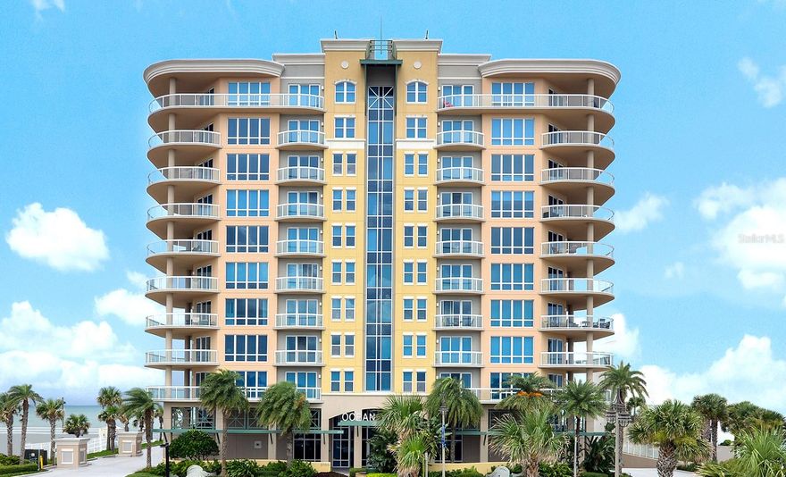 THIS LEADING LUXURY COASTAL CONDOMINIUM ESTATE UNVEILS A DREAM LIFESTYLE REVEALING FIRST-CLASS AMENITIES PAIRED WITH 5 STAR SERVICES. THE MAGNUM OPUS OF OCEAN VILLAS OFFERS EXPANSIVE LIVING IN ALMOST 4,000 SQ FT AND 2 PRIVATE SIDE BY SIDE PARKING SPACES. LOCATED ON THE CLUB LEVEL W/ AN IDYLLIC BLEND OF SPACIOUS, PRIVATE LIVING WITH HOSPITALITY INSPIRED CONVENIENCE. THE DOUBLE DOOR ENTRY OPENS TO A DREAMLAND WHERE EVERY WALL IS SCULPTURE, FLAUNTING S SHAPES, MORE AKIN TO ART THAN ARCHITECTURE AND THE CREAMY GLOSS, PORCELAIN FLOORING TRAVELS THROUGHOUT. THE ROTUNDA FOYER LEADS TO THE ZSA ZSA ZSU HIGH-CLASS, OVER THE TOP AND GLAMOROUS FEELING OF AWESTRUCK REVERANCE. THE FLOOR PLAN HAS 2 WINGS THAT EXTEND FROM EACH SIDE OF THE CENTRAL LIVING SPACES. LIKE A GLASS PRISM FLOATING ABOVE THE OCEAN, WALLS THAT BLUR THE BOUNDARY TO THE ALEROS BALCONY, WHERE EVERY MAJOR ROOM PROVIDES DIRECT ACCESS TO THE OUTDOOR SPACE. THE OWNER'S SUITE IS 1 OF 1, WITH HIS AND HERS BATHS THAT PROVIDE OWNERS WITH

PRIVACY THEY NEED TO GET READY FOR THE DAY. OWNERS EACH HAVE THEIR OWN RESTROOM SPACE, VANITY AND WARDROBE CLOSETS, WITH A WALK THROUGH SHOWER CREATING A SPACIOUS GRAND BATH THAT AMPLIFIES THE CONCEPT OF PERSONAL LUXURY TO AN ENTIRELY NEW LEVEL.

THE GUEST BEDROOM WITH BALCONY ACCESS AND ELECTRIC, HUNTER DOUGLAS LUMINETTE BLINDS IS SERENE AND RELAXING.

THE ARCHITECT CREATED AN OPEN-SPACE LIVING, DINING AND KITCHEN AS ONE SHOW-STOPPING ENTERTAINMENT SPACE. A MASTERCLASS IN OPEN-CONCEPT LIVING WHERE THE KITCHEN STANDS AS THE HEART OF THE HOME RATHER THAN A SEPARATE ZONE. THE BAR STRETCHES TOWARD THE LIVING AREA PROVIDING BOTH A PREP SPACE AND CASUAL SEATING.THE UPPER CABINETRY SOARS TO DOUBLE HEIGHT AND THE PENDANT LIGHTING ADDS TO THE COHESIVENESS. PARTIES OFTEN END UP IN THE KITCHEN SINCE WALLS DISSOLVED AND FLOW INTO THE DINING AREA DESIGNED FOR LINGERING. THE CHUNKY DINING TABLE, STYLISH, DECORATOR LIGHTING WITH A FIREPLACE AS THE BACKDROP ANCHOR THE OPEN LAYOUT.
A DELUXE ENSUITE AND PRIVATE HOME OFFICE OR THEATRE ROOM WITH A POWDER ROOM BATH SHARE THE GUEST WING.
STEPS FROM THE OCEANFRONT FITNESS AND OWNER'S LOUNGE THIS CONDOMINIUM HOME IS THE PERFECT COMBINATION OF ARCHITECTURAL BRILLIANCE AND LIFESTYLE LUXURY.