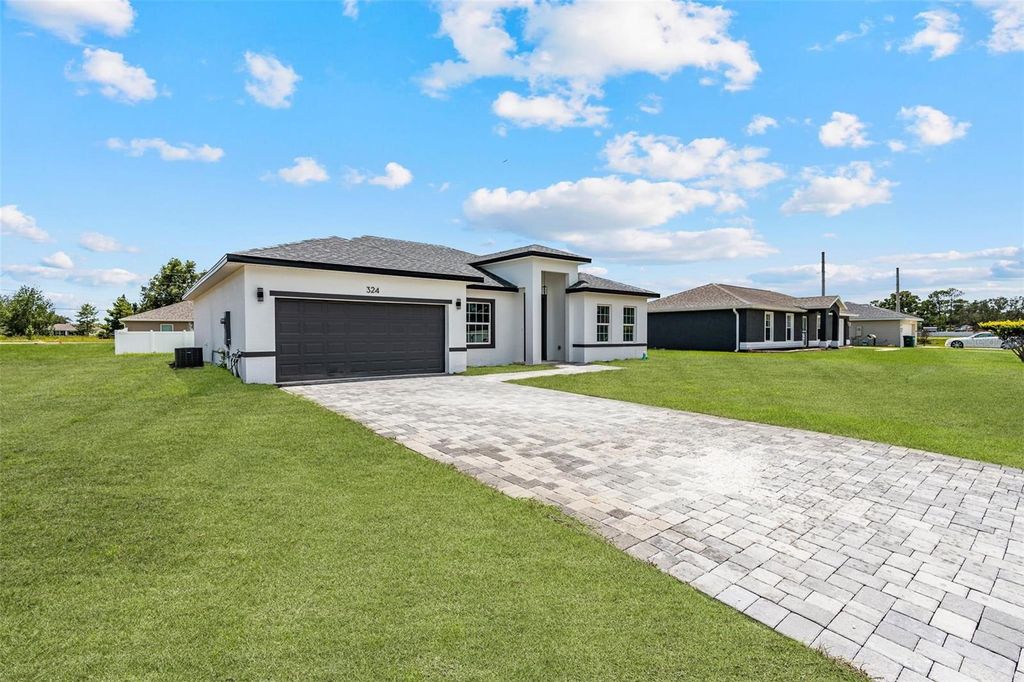 Photo of 324 Marion Oaks Trail, Ocala, FL 34473 (MLS # O6325251)