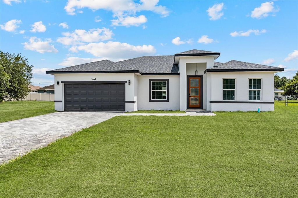 Photo of 324 Marion Oaks Trail, Ocala, FL 34473 (MLS # O6325251)