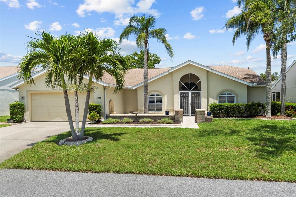 Photo of 6009 Cedarwood Ln, Bradenton, FL 34203 (MLS # TB8394679)