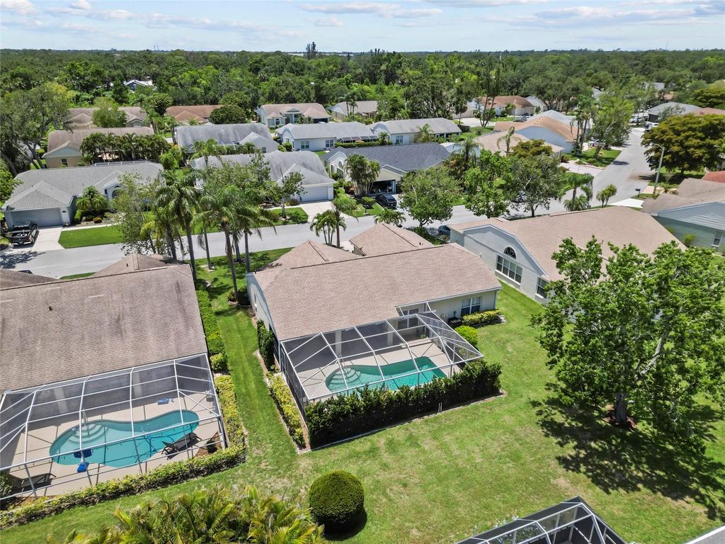 Photo of 6009 Cedarwood Ln, Bradenton, FL 34203 (MLS # TB8394679)