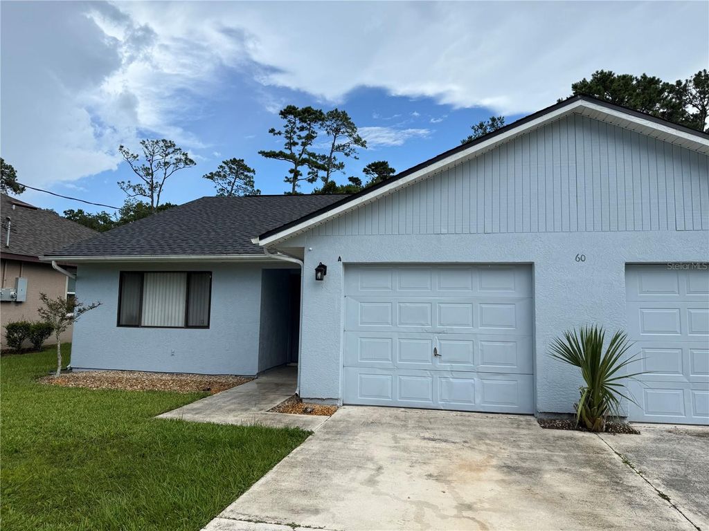 Photo of 60 Farmsworth Drive #A&amp;B, Palm Coast, FL 32137 (MLS # FC314626)