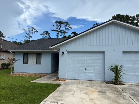 Photo of 60 Farmsworth Drive #A&B, Palm Coast, FL 32137 (MLS # FC314626)