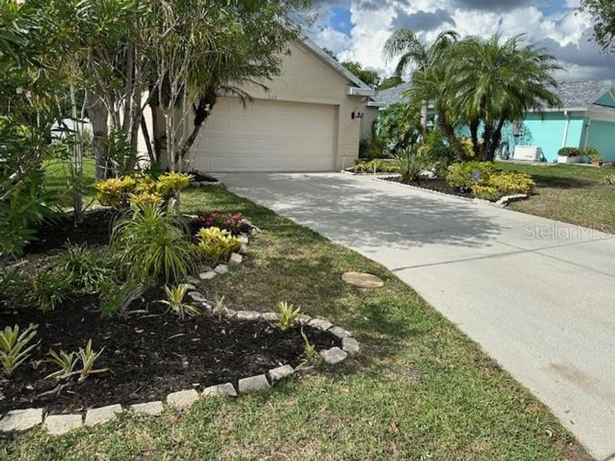 Welcome to the highly, sought-after community of Carlyle at The Villages of Palm-Aire, which is strategically located in North Sarasota near the Palm Aire Golf & Country Club. In this quaint and secluded community, this property provides the perfect blend of elegance, style, and serenity featuring a recently updated 3-bedroom, 2-bathroom home, and 1800 square foot home which includes a formal dining room with custom, glass-paneled French Doors, an Air-Conditioned Safe Room, a spacious 2-car garage and a vinyl, privacy fenced yard for your pets.  Recent updates include a 2025 Roof with a transferable warranty, new Kitchen Aid Stainless-Steel Refrigerator and Dishwasher, a Broan Range Hood, Fresh Paint throughout the home, new Ceiling Fans and Landscaping. The Open Floor plan encompasses the chef's kitchen with a breakfast bar, granite countertops, an eat-in space, a large island for food preparation, a GE (5)  burner gas stove, a GE Profile Built-In Convection Oven and Microwave Oven and custom cabinetry including (4) Glass Door Cabinets with pull Up Doors, a roll-out trash cabinet and a Lazy Susan lower cabinet. The kitchen intertwines with the living room providing an excellent option for family gatherings and entertaining.  The split floor plan offers privacy and functionality, with the primary suite providing a peaceful retreat complete with a double vanity, new lighting, a soaking tub, shower and a custom-built, walk-in closet. The guest bathroom provides direct access to the lanai for you and your guests while entering on the lanai.  The laundry is separated from the kitchen with a pocket door and is equipped with brand new LG Thin Washer and Dryer appliances with additional storage cabinets. Step outside to your backyard paradise—a plant lover’s dream—with a large, screened and covered lanai, fountain pond water feature, and lush landscaping that creates a serene retreat for relaxing or entertaining. Located in an amenity-rich community, you’ll enjoy pickleball, tennis courts, a sparkling community pool, and a playground. Ideally situated near the vibrant University Parkway/UTC Mall corridor, this home is just minutes from Downtown Sarasota, St. Armand’s Circle, and world-class beaches. Sarasota International Airport is only 15 minutes away, ensuring effortless travel. With its excellent location, thoughtful upgrades, and community perks, this home is a rare find. Schedule your private tour today and start LIVING YOUR BEST FLORIDA LIFE ON THE GULF COAST!